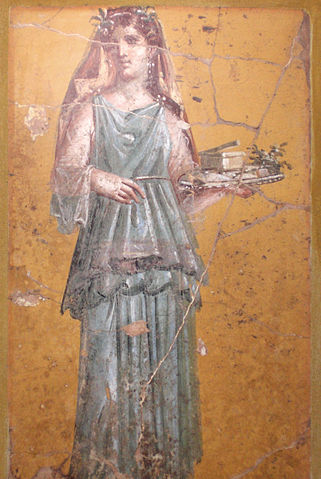 Roman woman carrying a tray 