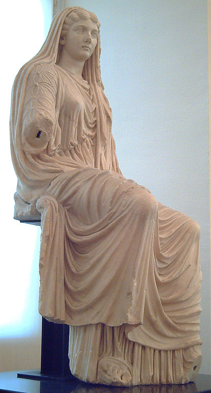 Roman woman wearing traditional conservative Roman dress 