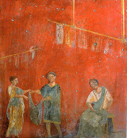 A painting of women hanging up clothes together 